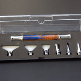 Set of Diamond Painting attachments in a clear plastic case on a gray background